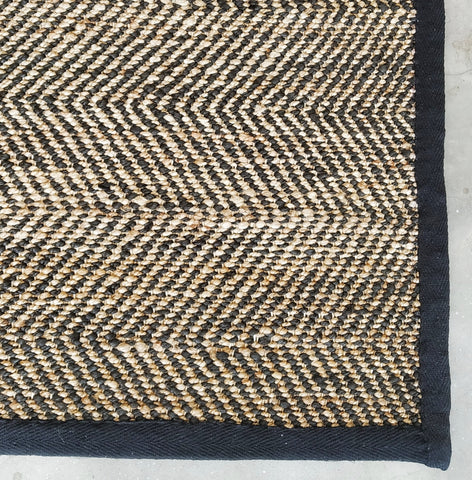 Braided Jute Rug with neutral stripe
